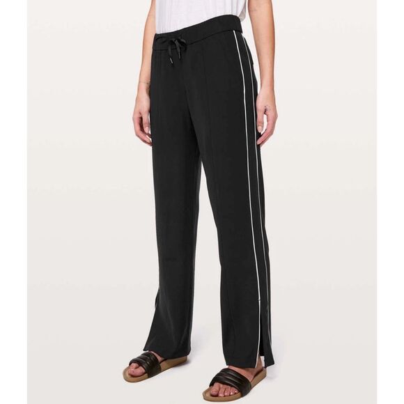 lululemon athletica Pants - Lululemon On The Right Track Womens Pants Black Loose Fit Slit Hem Size 10